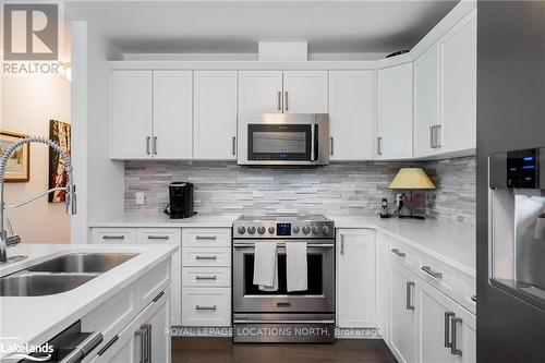 309 - 1 Chamberlain Crescent, Collingwood, ON - Indoor Photo Showing Kitchen With Double Sink With Upgraded Kitchen