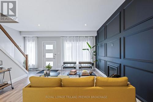 6 - 727 Apricot Drive, London, ON - Indoor Photo Showing Living Room With Fireplace