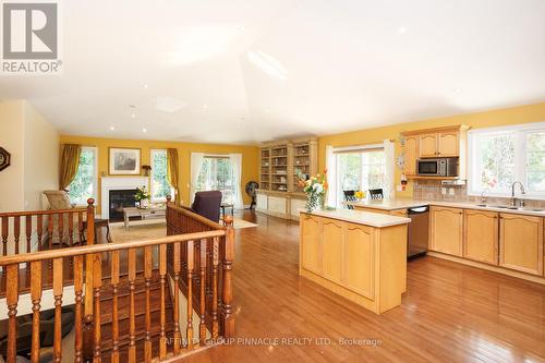 2 Fallingbrook Crescent, Kawartha Lakes (Lindsay), ON - Indoor Photo Showing Kitchen With Fireplace