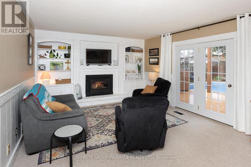 10 Mcdonagh Drive, Kawartha Lakes (Lindsay), ON - Indoor Photo Showing Living Room With Fireplace