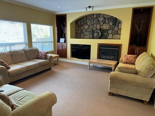 2625 Forksdale Ave, Merritt, BC - Indoor Photo Showing Living Room With Fireplace