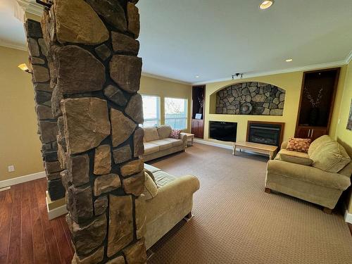 2625 Forksdale Ave, Merritt, BC - Indoor Photo Showing Living Room With Fireplace