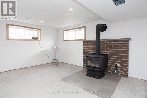 654 White Rock Road, Kawartha Lakes (Oakwood), ON - Indoor Photo Showing Other Room With Fireplace