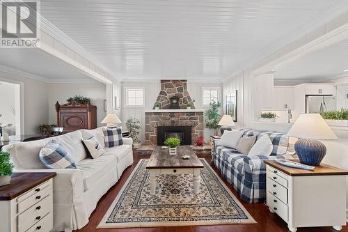 44 Cedar Beach Road, Brock (Beaverton), ON - Indoor Photo Showing Living Room With Fireplace