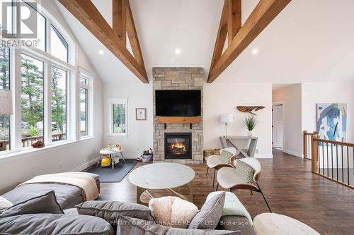 103B Carriage Landing Road, Renfrew, ON - Indoor Photo Showing Living Room With Fireplace