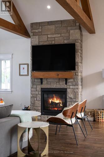 103B Carriage Landing Road, Renfrew, ON - Indoor Photo Showing Living Room With Fireplace