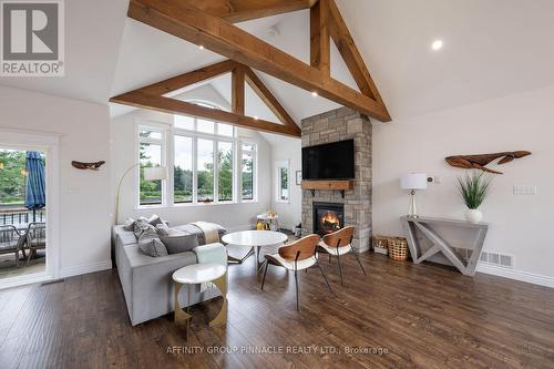 103B Carriage Landing Road, Renfrew, ON - Indoor Photo Showing Living Room With Fireplace