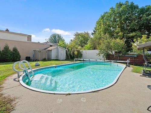 Pool - 462 Rue Surprenant, Drummondville, QC - Outdoor With In Ground Pool With Backyard