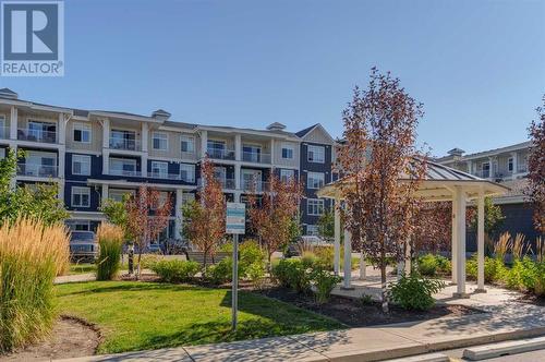 221, 400 Auburn Meadows Common Se, Calgary, AB - Outdoor With Balcony With Facade