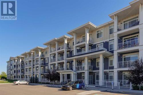 221, 400 Auburn Meadows Common Se, Calgary, AB - Outdoor With Balcony With Facade