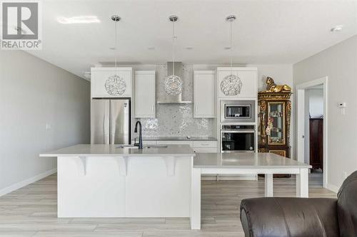 221, 400 Auburn Meadows Common Se, Calgary, AB - Indoor Photo Showing Kitchen With Upgraded Kitchen