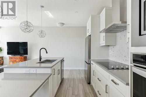 221, 400 Auburn Meadows Common Se, Calgary, AB - Indoor Photo Showing Kitchen With Double Sink With Upgraded Kitchen