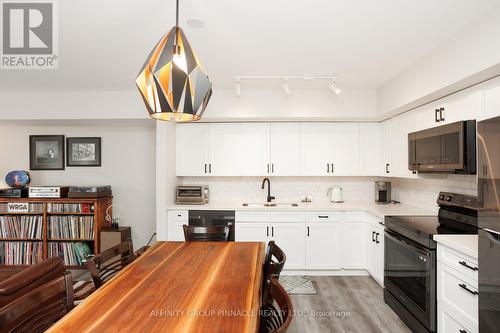 105 - 25 King Street, Kawartha Lakes (Lindsay), ON - Indoor Photo Showing Kitchen With Double Sink