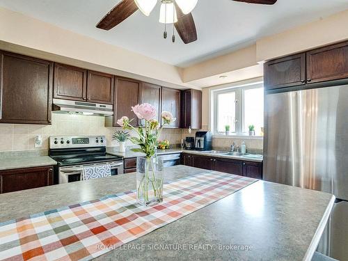 114-4950 Winston Churchill Blvd E, Mississauga, ON - Indoor Photo Showing Kitchen With Stainless Steel Kitchen With Double Sink