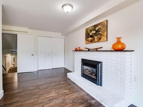 3448 Caplan Cres, Burlington, ON - Indoor Photo Showing Living Room With Fireplace