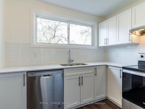 76 Woodman Dr N, Hamilton, ON - Indoor Photo Showing Kitchen With Double Sink