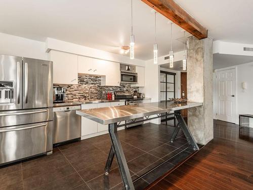 Cuisine - 210-1360 Rue St-Jacques, Montréal (Ville-Marie), QC - Indoor Photo Showing Kitchen With Upgraded Kitchen