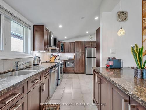 130 Verobeach Blvd, Toronto, ON - Indoor Photo Showing Kitchen With Double Sink