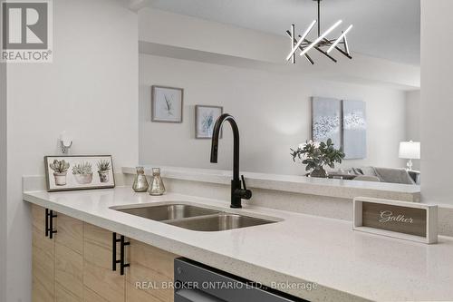 509 - 101 Subway Crescent, Toronto, ON - Indoor Photo Showing Kitchen With Double Sink