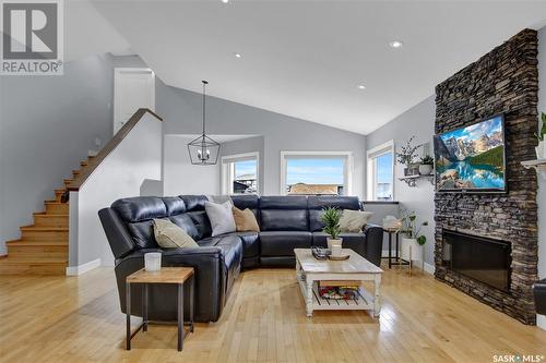 8030 Fairways West Drive, Regina, SK - Indoor Photo Showing Living Room With Fireplace