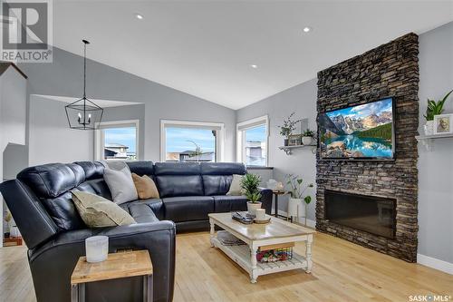 8030 Fairways West Drive, Regina, SK - Indoor Photo Showing Living Room With Fireplace