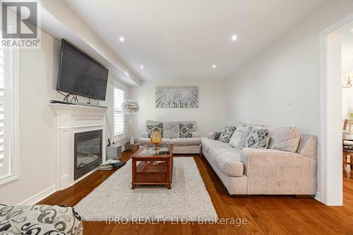 49 Australia Drive, Brampton, ON - Indoor Photo Showing Living Room With Fireplace