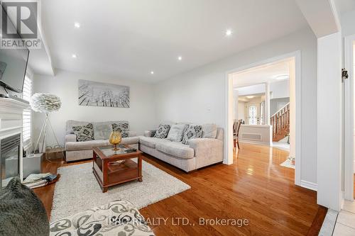 49 Australia Drive, Brampton, ON - Indoor Photo Showing Living Room With Fireplace