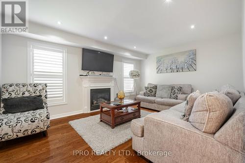 49 Australia Drive, Brampton, ON - Indoor Photo Showing Living Room With Fireplace