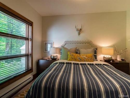 Chambre Ã Â coucher - 4880 Rue De La Grande-Promenade, Sainte-Adèle, QC - Indoor Photo Showing Bedroom