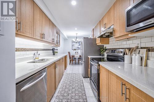 10 - 20 Scarfair Pt Way, Toronto (Malvern), ON - Indoor Photo Showing Kitchen With Stainless Steel Kitchen With Double Sink