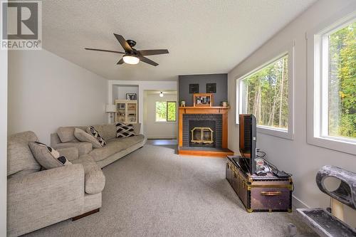 3895 Christopher Drive, Prince George, BC - Indoor Photo Showing Living Room With Fireplace