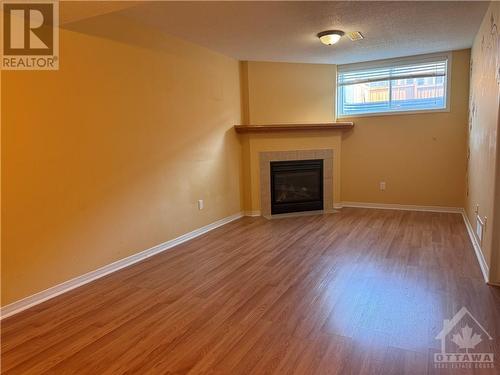 178 Berrigan Drive, Ottawa, ON - Indoor Photo Showing Living Room With Fireplace