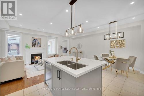 3079 Neyagawa Boulevard, Oakville, ON - Indoor Photo Showing Kitchen With Fireplace With Double Sink With Upgraded Kitchen