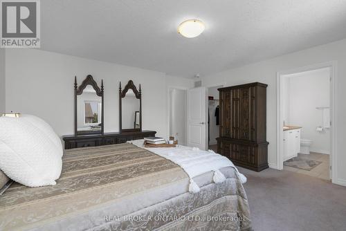 14 Jones Street, New Tecumseth, ON - Indoor Photo Showing Bedroom