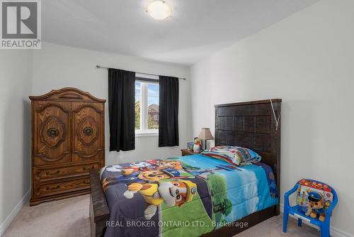 14 Jones Street, New Tecumseth, ON - Indoor Photo Showing Bedroom