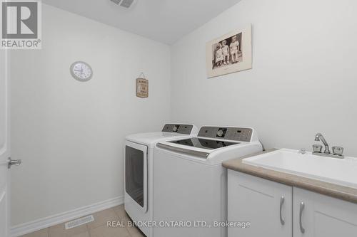 14 Jones Street, New Tecumseth, ON - Indoor Photo Showing Laundry Room