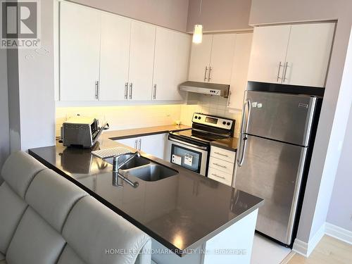 214 - 8130 Birchmount Road, Markham, ON - Indoor Photo Showing Kitchen With Double Sink