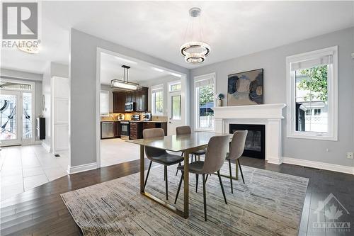 2634 Fallingwater Circle, Ottawa, ON - Indoor Photo Showing Dining Room With Fireplace