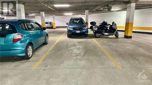 Designated parking space #84 on 2nd floor - 370 Dominion Avenue Unit#304, Ottawa, ON - Indoor Photo Showing Garage