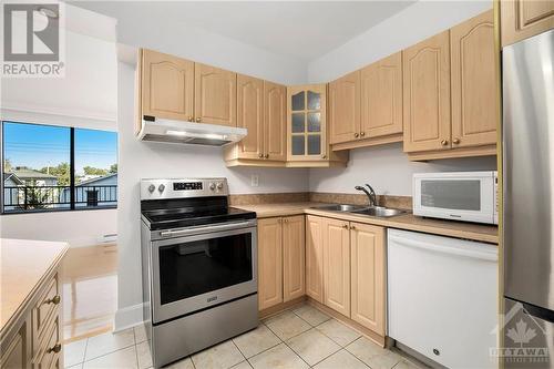 Stainless steel fridge & stove - 370 Dominion Avenue Unit#304, Ottawa, ON - Indoor Photo Showing Kitchen With Stainless Steel Kitchen With Double Sink