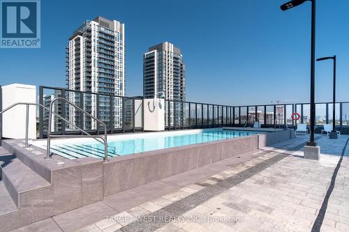 311 - 36 Zorra Street W, Toronto, ON - Outdoor With In Ground Pool