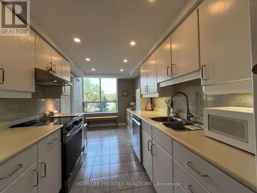 411 - 1 Ripley Avenue, Toronto (High Park-Swansea), ON - Indoor Photo Showing Kitchen With Double Sink With Upgraded Kitchen