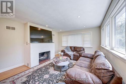 1235 Old River Road, Mississauga, ON - Indoor Photo Showing Living Room With Fireplace