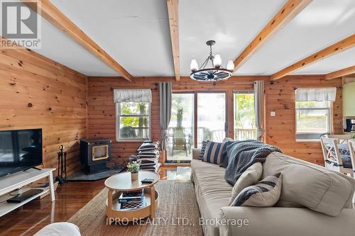 4 - 1125 Carlo Enterprise Road, Muskoka Lakes, ON - Indoor Photo Showing Living Room With Fireplace