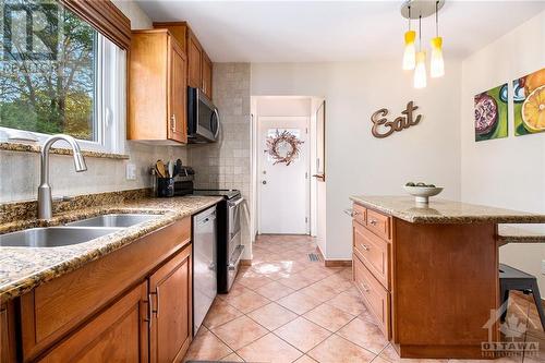 64 Beechmont Crescent, Ottawa, ON - Indoor Photo Showing Kitchen With Double Sink