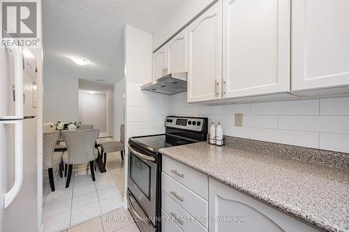 103 - 10 Tapscott Road, Toronto, ON - Indoor Photo Showing Kitchen