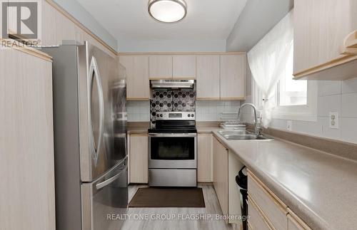 107 - 11 Harrisford Street, Hamilton (Red Hill), ON - Indoor Photo Showing Kitchen With Stainless Steel Kitchen With Double Sink