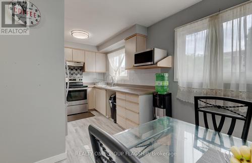 107 - 11 Harrisford Street, Hamilton (Red Hill), ON - Indoor Photo Showing Kitchen With Double Sink