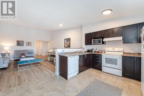 412 - 1350 Main Street E, Milton (Dempsey), ON - Indoor Photo Showing Kitchen