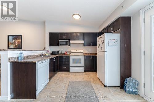 412 - 1350 Main Street E, Milton (Dempsey), ON - Indoor Photo Showing Kitchen